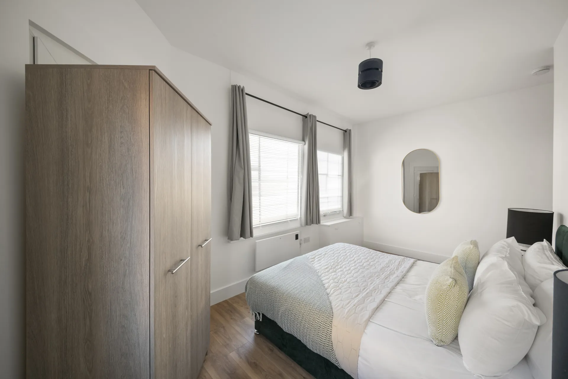 Full-height wardrobe with proper hanging space for a long stay