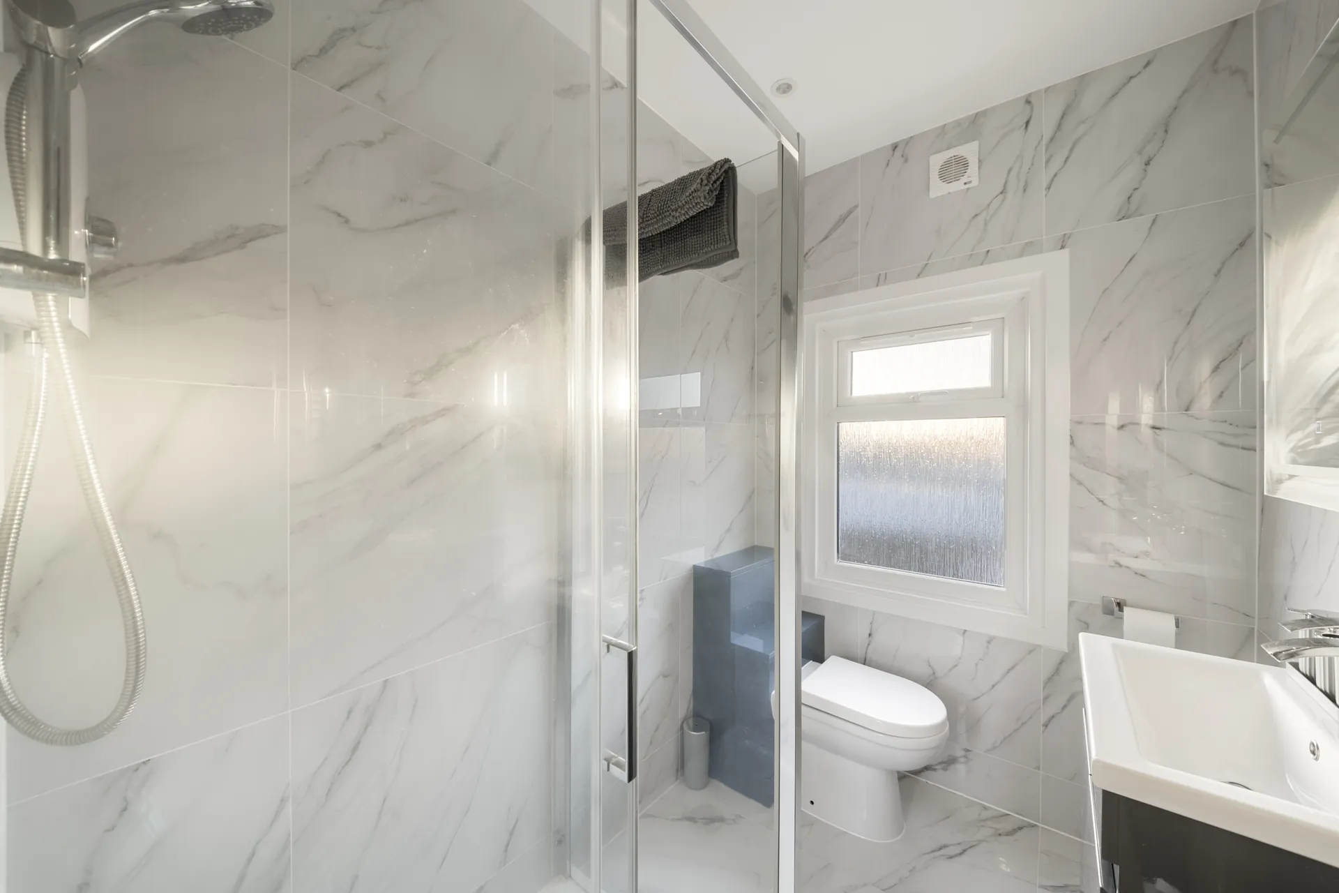 The bathroom, with a large walk-in shower