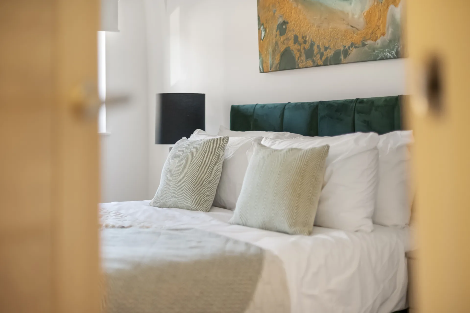 Original artwork above the bed